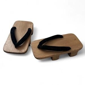 Traditional Japanese wooden geta clogs with black velvet straps